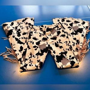Cow print bell bottoms